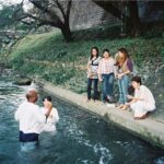 Reverend Maiyaki baptising Church Members in Japan